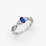 Oval Sapphire Ring with Diamonds in Gold