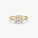 Three Stone Marquise Diamond Ring in Gold