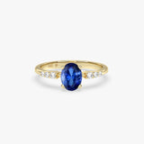 Solid Gold Oval Sapphire Ring with Diamonds