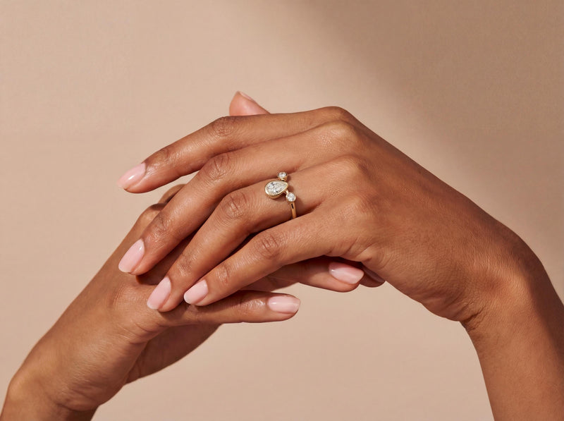 Pear Bezel Diamond Ring in Gold