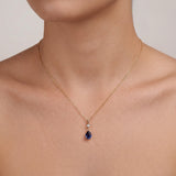 Pear Gemstone Pendant Necklace with White Sapphire Accent in Gold